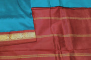 Kanchi pure silk saree in peacock blue with red border. ( 9 yards)