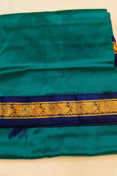 Kanchi pure silk saree in peacock blue with blue border. ( 9 yards)