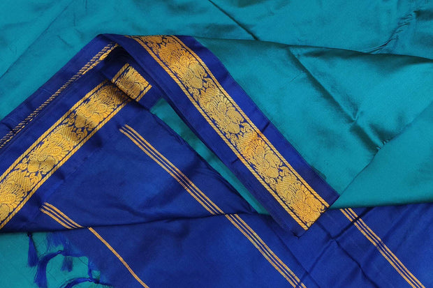 Kanchi pure silk saree in peacock blue with blue border. ( 9 yards)