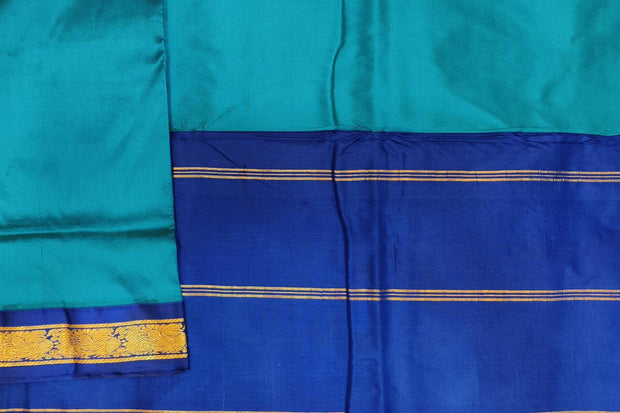 Kanchi pure silk saree in peacock blue with blue border. ( 9 yards)