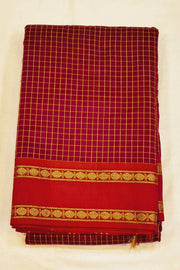 Fine checks silk cotton saree in red.