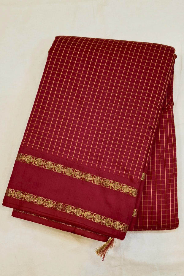 Fine checks silk cotton saree in magenta.