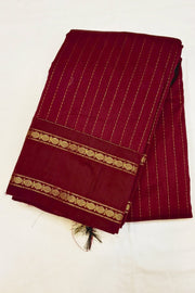 Striped silk cotton saree in magenta.