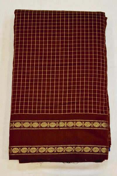 Fine checks silk cotton saree in brown with a contrast pallu in blue.