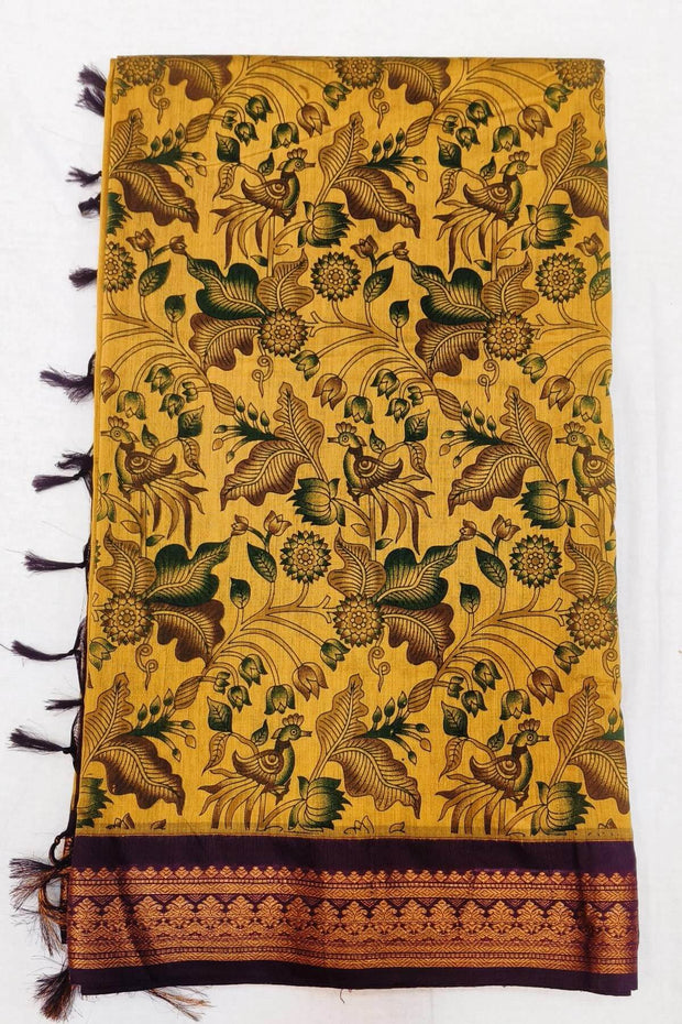 Printed cotton saree in mustard & wine with rich pallu