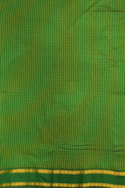 Fine checks cotton saree in  green.