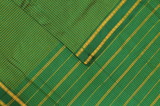 Fine checks cotton saree in  green.