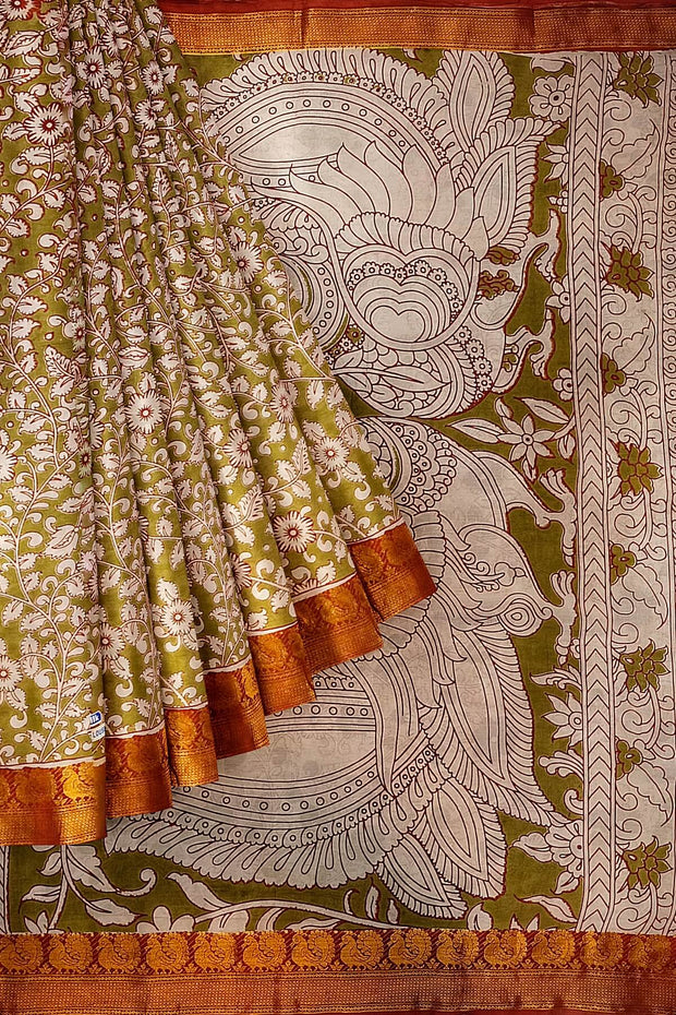 Mangalgiri silk cotton saree in mehndi green with kalamkari print