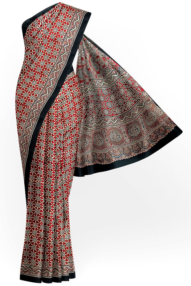 Modal silk saree in red with floral motifs in hand block ajrakh print