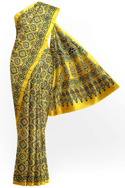 Modal silk saree in yellow with floral motifs in hand block ajrakh print