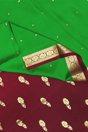 Mysore crepe silk saree in green with small motifs all over the body.