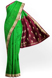 Mysore crepe silk saree in green with small motifs all over the body.