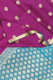 Mysore crepe silk saree in purple with floral  motifs all over the body.