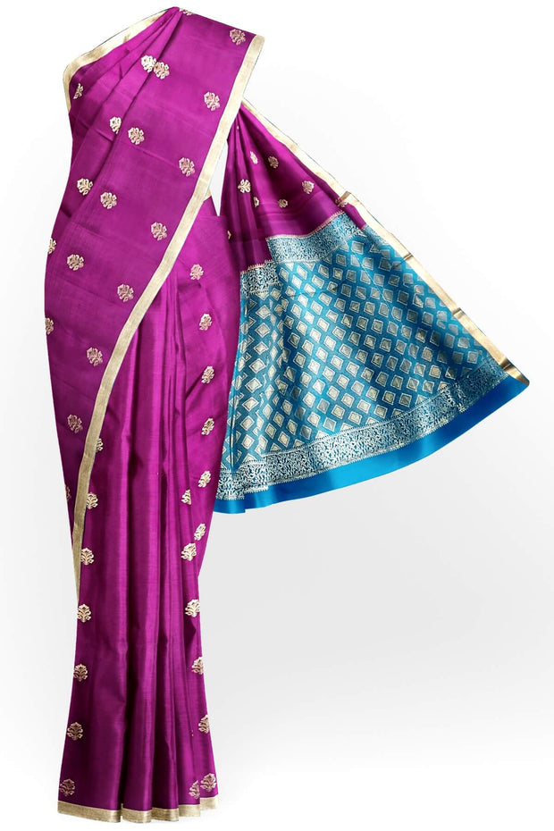 Mysore crepe silk saree in purple with floral  motifs all over the body.