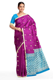 Mysore crepe silk saree in purple with floral  motifs all over the body.