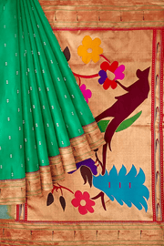 Paithani pure silk saree in Rama green  with small motifs with a muniya border