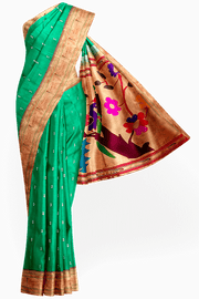 Paithani pure silk saree in Rama green  with small motifs with a muniya border