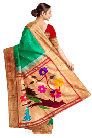 Paithani pure silk saree in Rama green  with small motifs with a muniya border