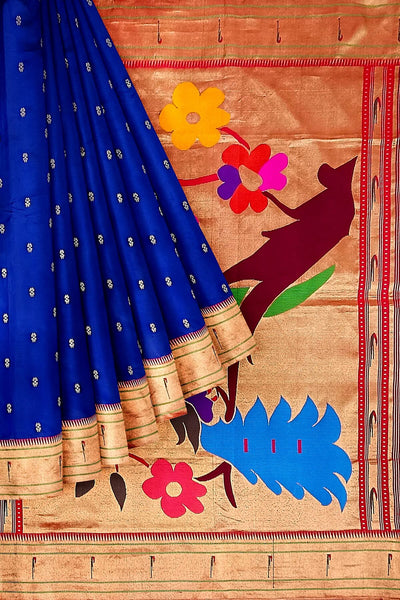 Paithani pure silk saree in blue  with small motifs and a fancy pallu with muniya border