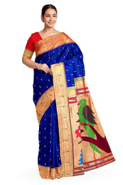 Paithani pure silk saree in blue  with small motifs and a fancy pallu with muniya border