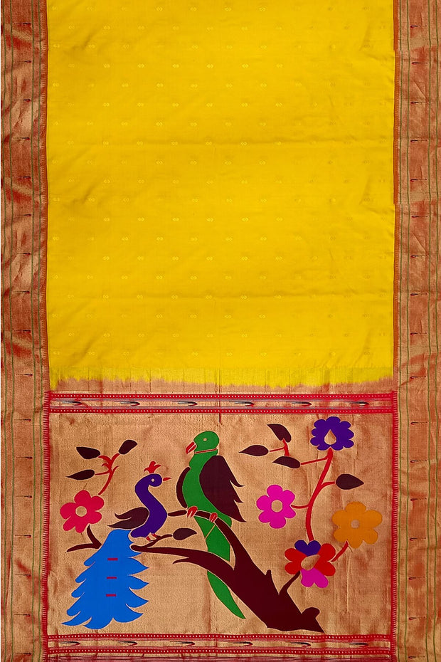 Paithani pure silk saree in yellow  with small motifs and a fancy pallu with muniya border