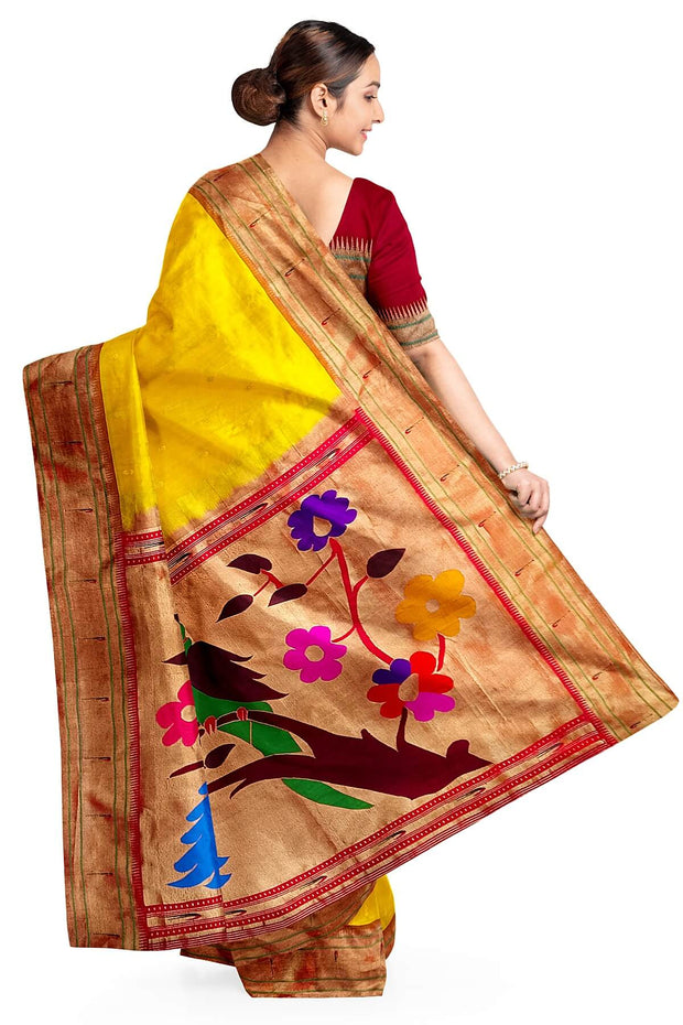 Paithani pure silk saree in yellow  with small motifs and a fancy pallu with muniya border