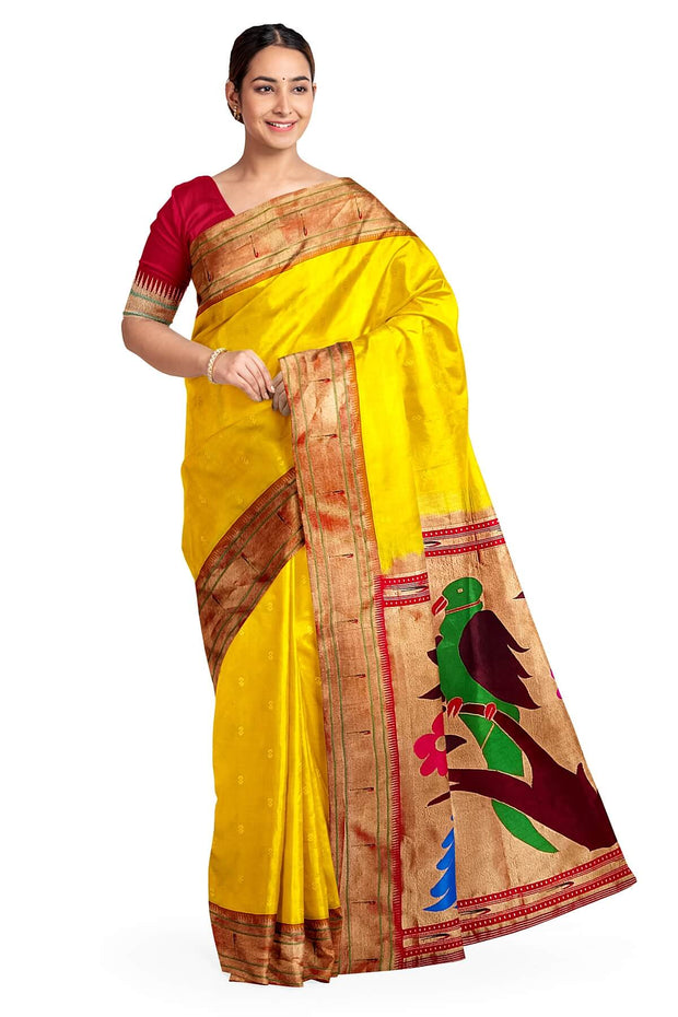 Paithani pure silk saree in yellow  with small motifs and a fancy pallu with muniya border