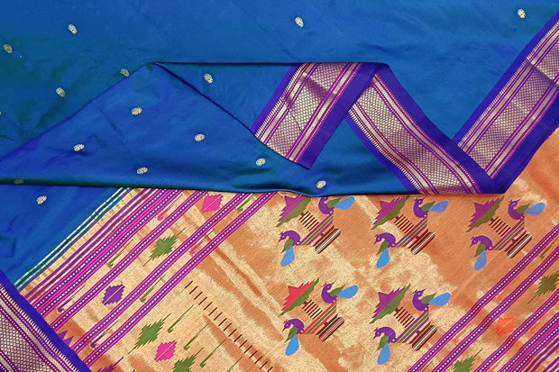 Handwoven Paithani pure silk saree in  peacock blue with paisley motifs