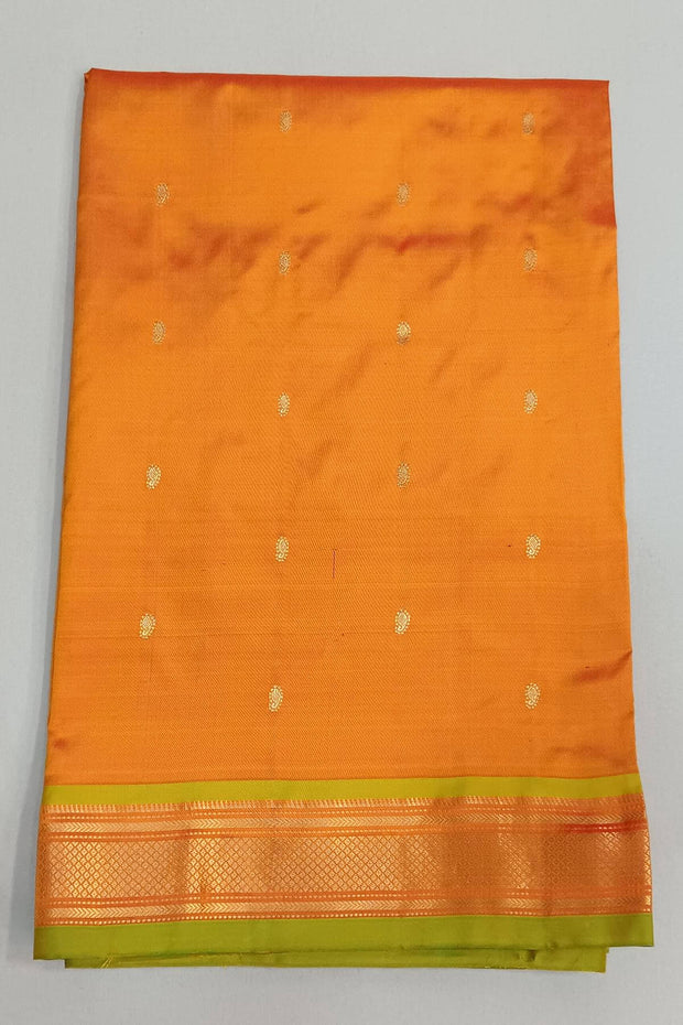 Handwoven Paithani pure silk saree in mustard yellow with paisley motifs