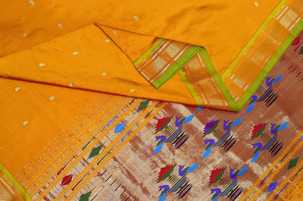 Handwoven Paithani pure silk saree in mustard yellow with paisley motifs