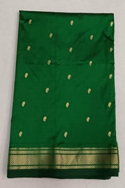 Handwoven Paithani pure silk saree in dark green with paisley motifs