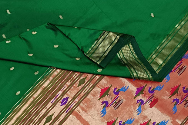 Handwoven Paithani pure silk saree in dark green with paisley motifs