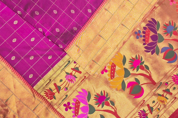 Handwoven Paithani pure silk saree in purple with checks & buttis on the body .