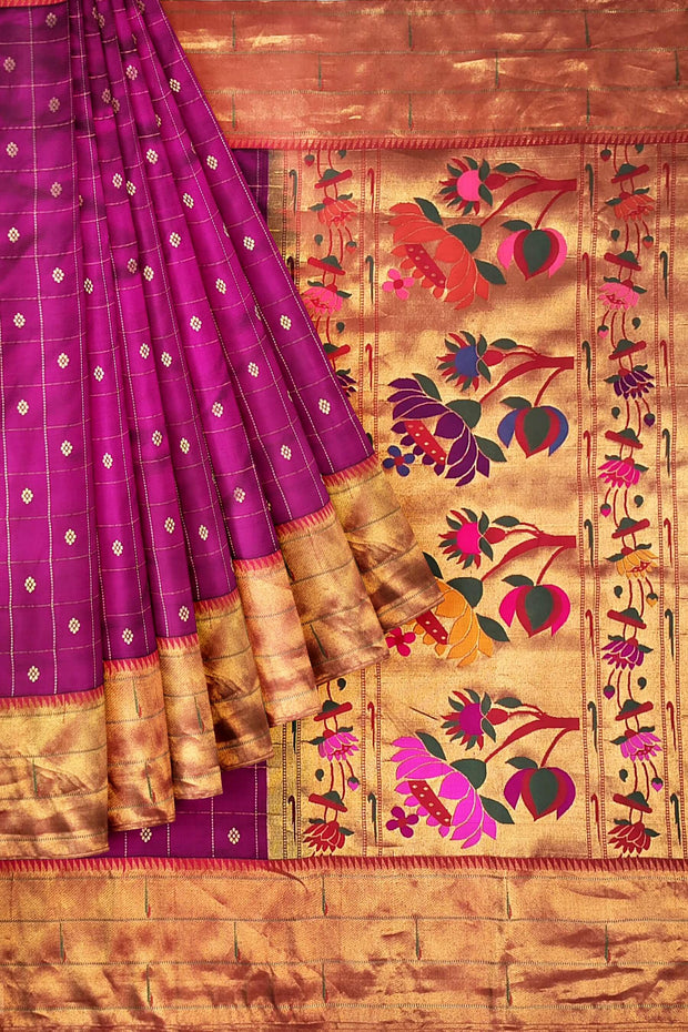 Handwoven Paithani pure silk saree in purple with checks & buttis on the body .