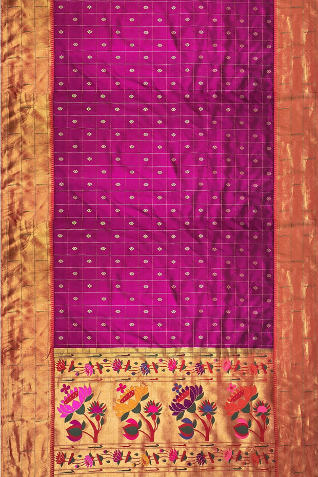 Handwoven Paithani pure silk saree in purple with checks & buttis on the body .