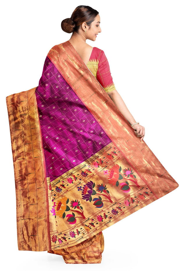 Handwoven Paithani pure silk saree in purple with checks & buttis on the body .