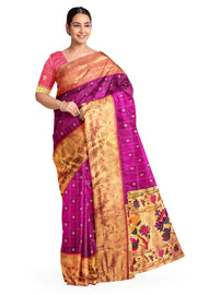 Handwoven Paithani pure silk saree in purple with checks & buttis on the body .