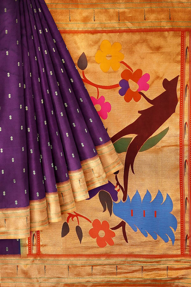 Paithani pure silk saree in wine with  buttis on the body .