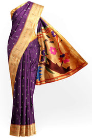 Paithani pure silk saree in wine with  buttis on the body .