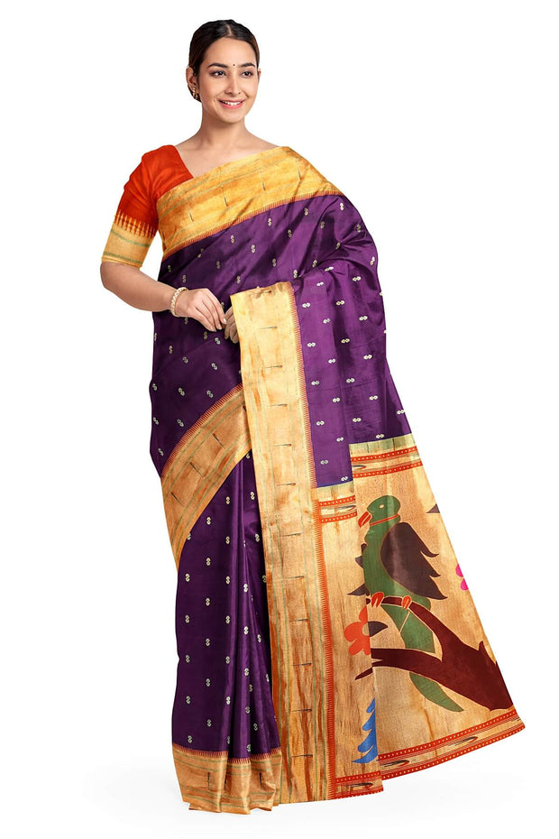 Paithani pure silk saree in wine with  buttis on the body .