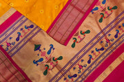 Paithani pure silk saree in mango yellow with small buttis all over the body