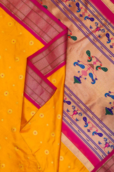 Paithani pure silk saree in mango yellow with small buttis all over the body