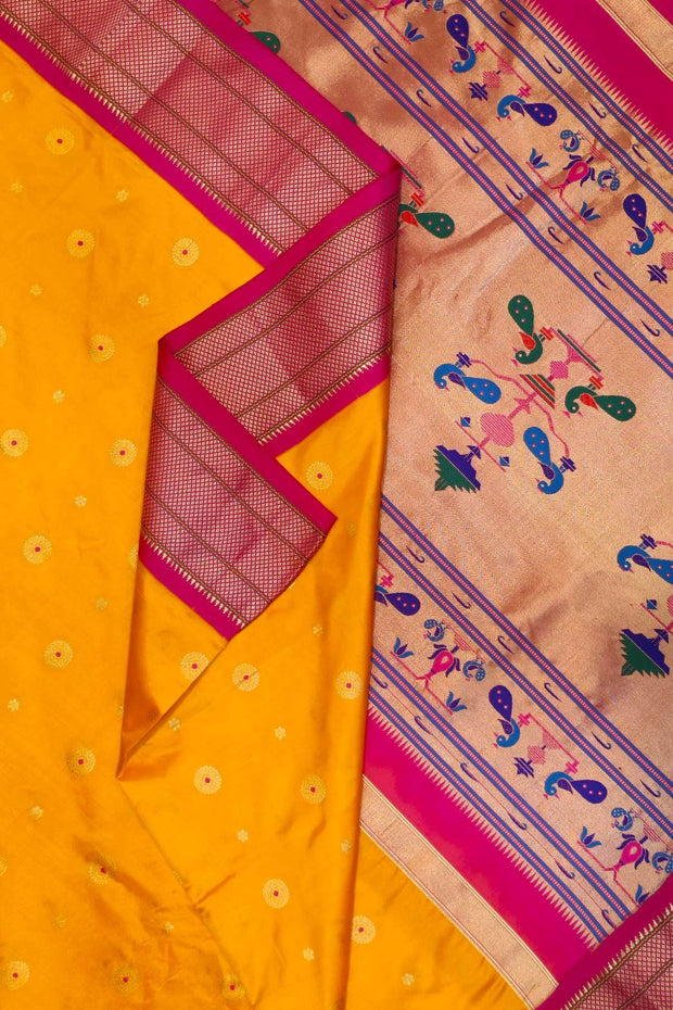 Paithani pure silk saree in mango yellow with small buttis all over the body