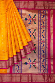 Paithani pure silk saree in mango yellow with small buttis all over the body