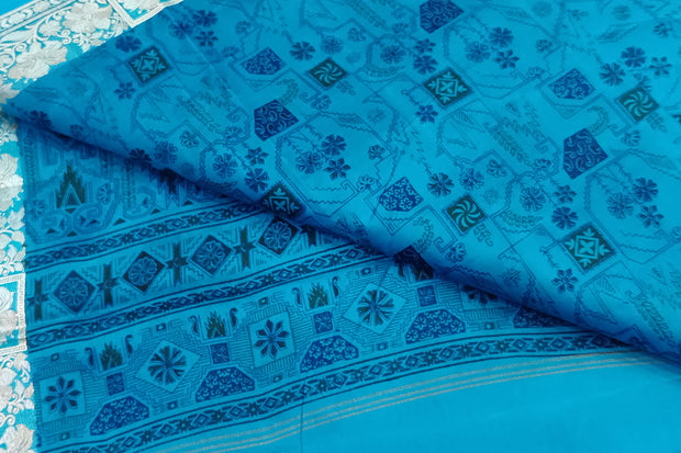 Printed pure silk saree in copper sulphate blue