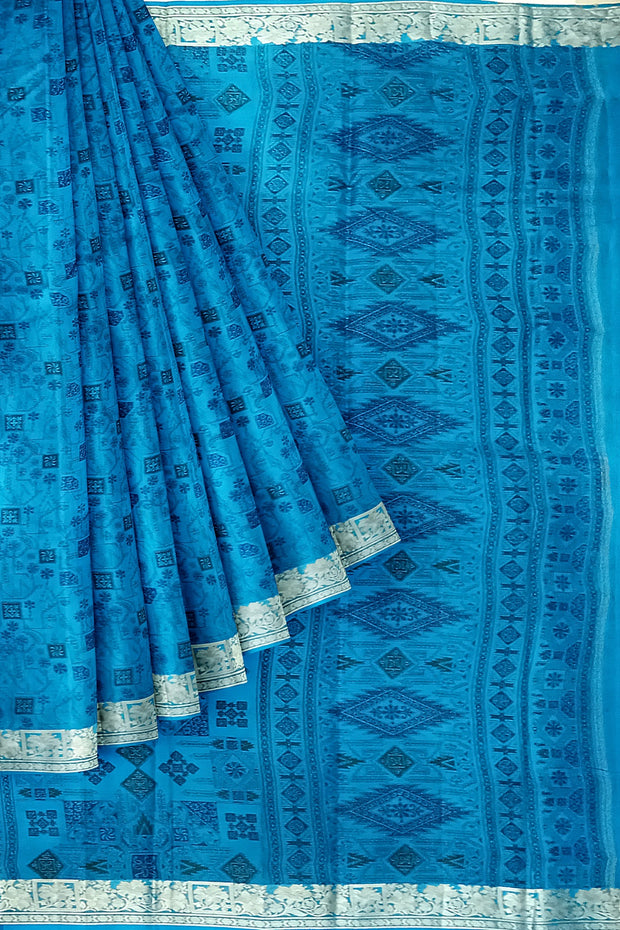 Printed pure silk saree in copper sulphate blue