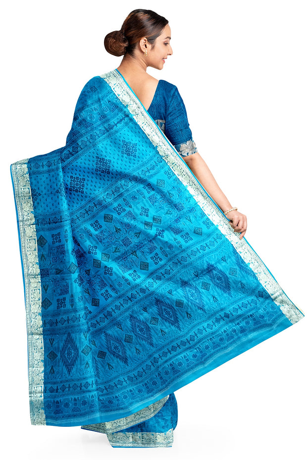 Printed pure silk saree in copper sulphate blue