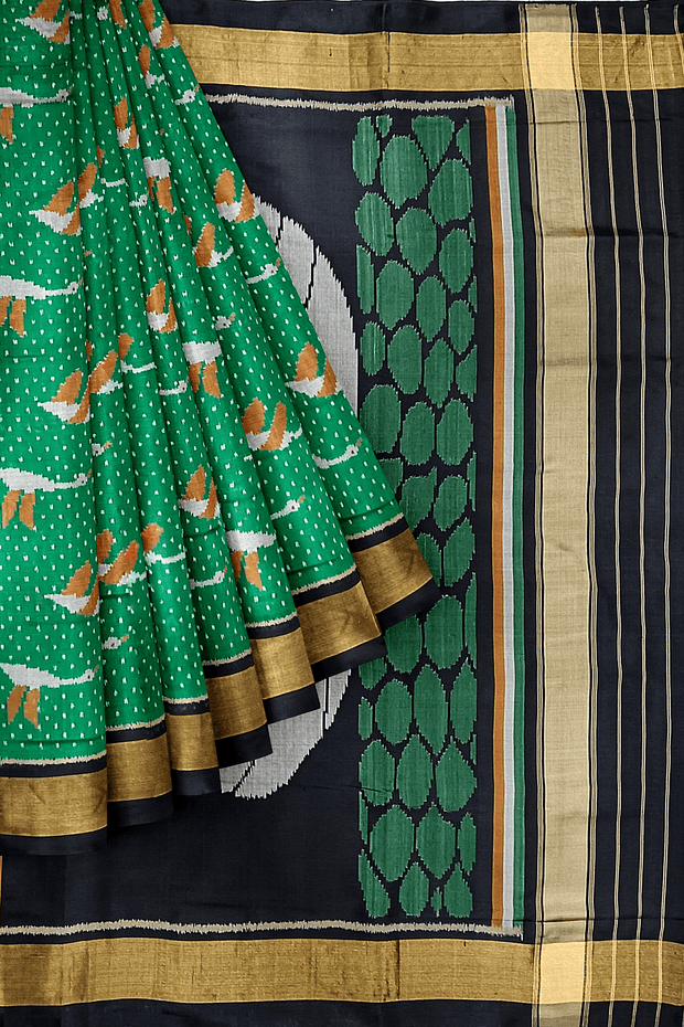 Handwoven Patola pure silk saree in green  with bird motifs