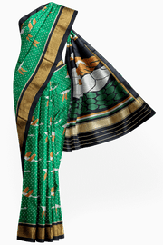 Handwoven Patola pure silk saree in green  with bird motifs