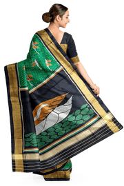 Handwoven Patola pure silk saree in green  with bird motifs